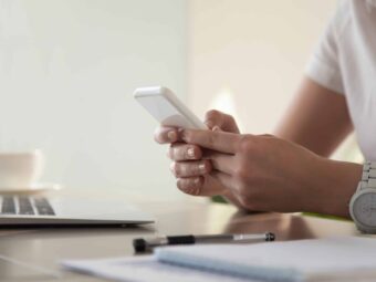Businesswoman looking important contact on phone